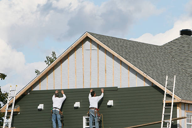 Professional Siding Installation technician working in Redmond, WA